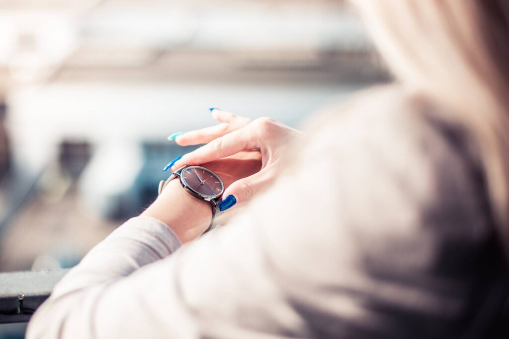 Woman Checking The Time on Her Fashion Watches Free Photo