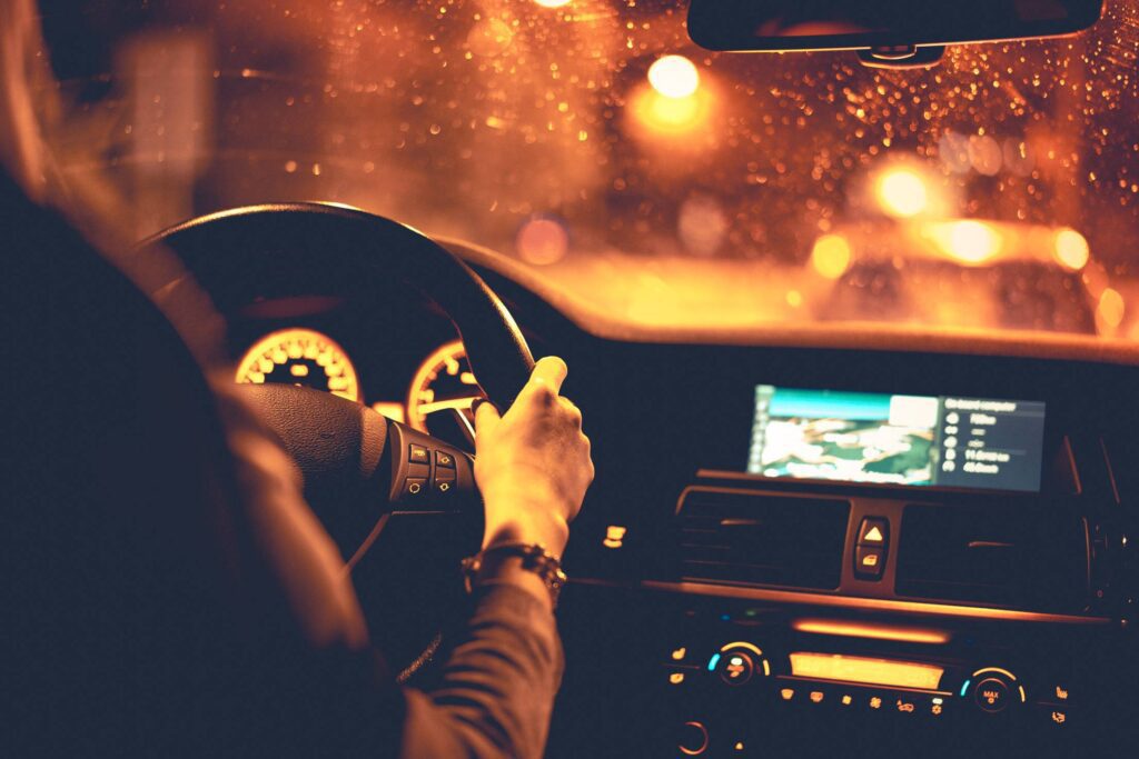 Woman Driving at Night Free Photo