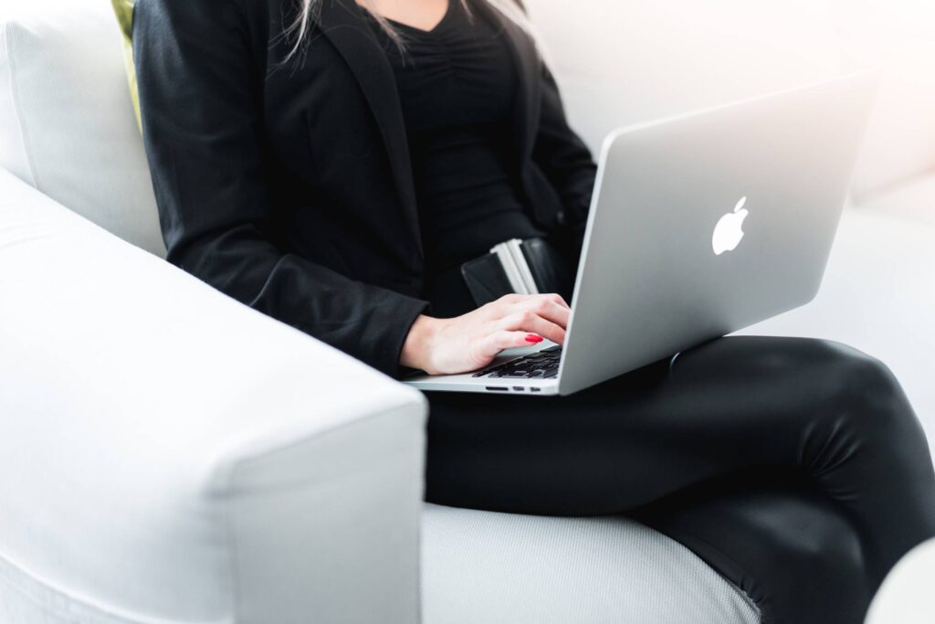 Woman Entrepreneur Working on Silver Laptop Free Photo