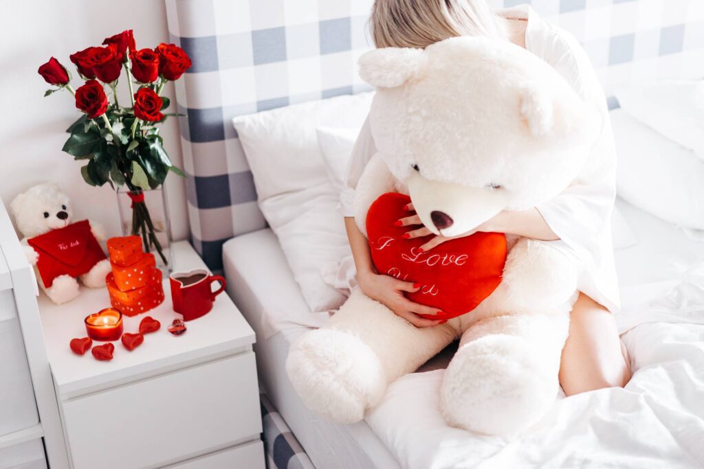 Woman Hugging Big Teddy Bear Free Photo