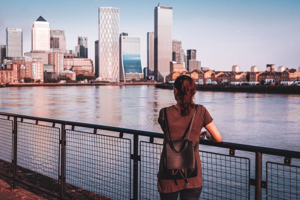 Woman Looking at Canary Wharf Business District Skyscrapers Free Photo