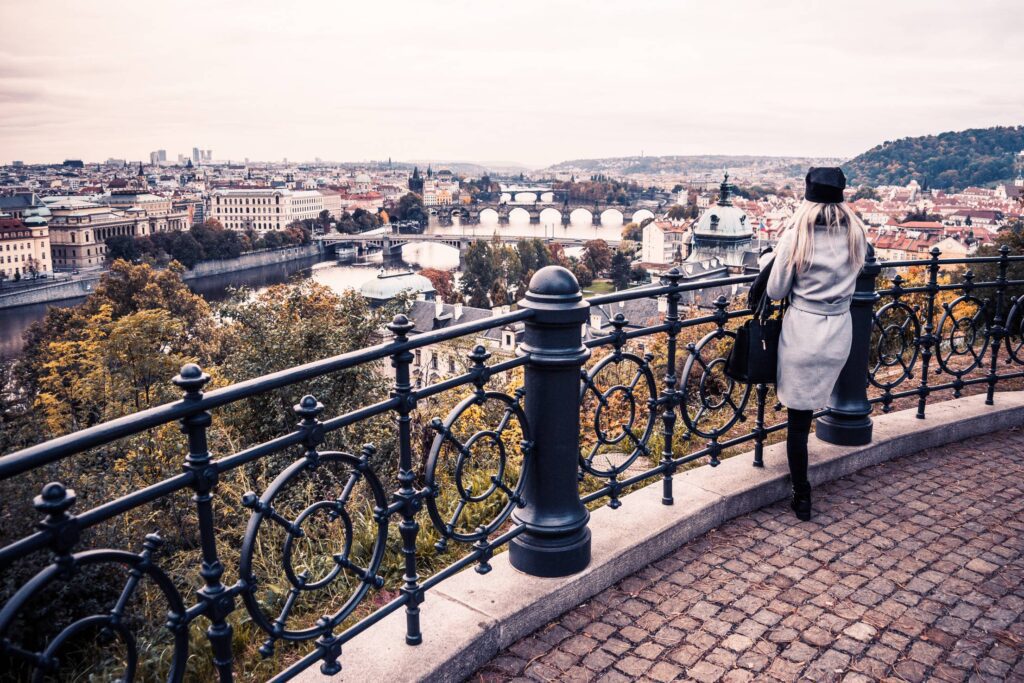 Woman Looking Over The Autumn Prague Free Photo