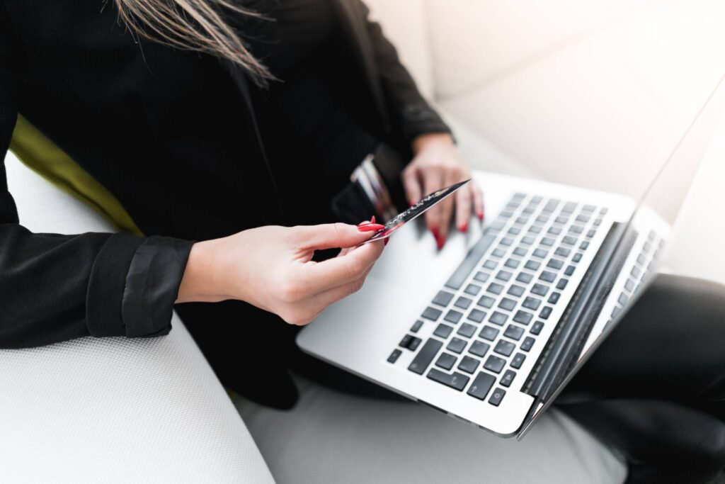 Woman Purchasing a Product with Credit Card Free Photo