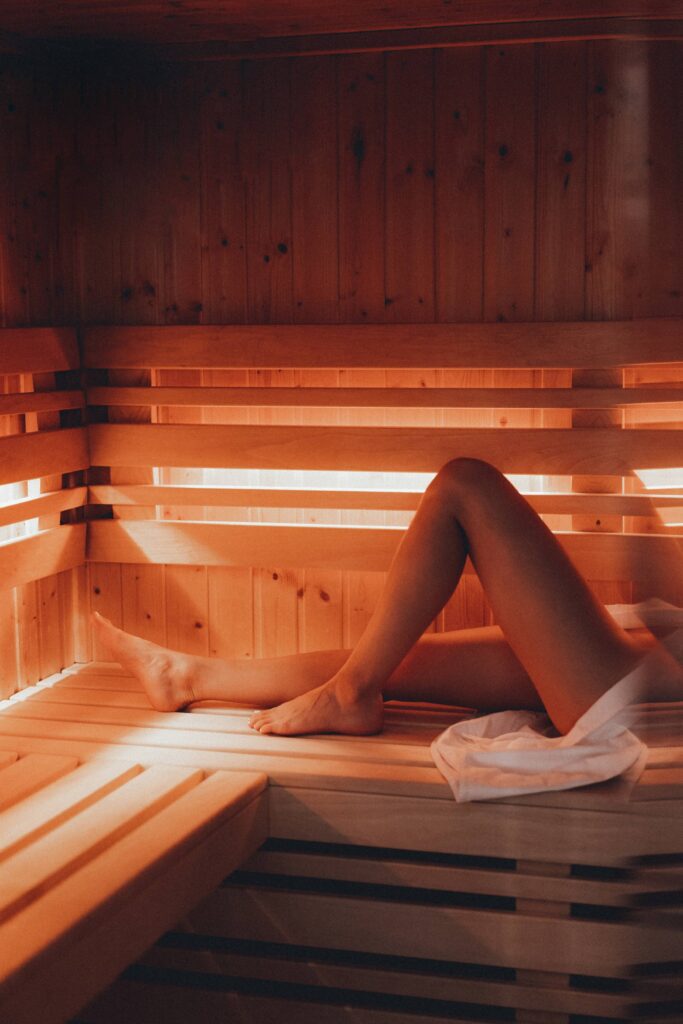 Woman Relaxing in Sauna Free Photo