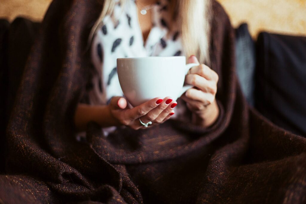 Woman with a Cup of Tea Free Photo