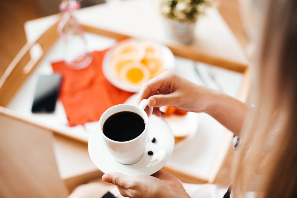 Woman with Morning Coffee & Breakfast Free Photo