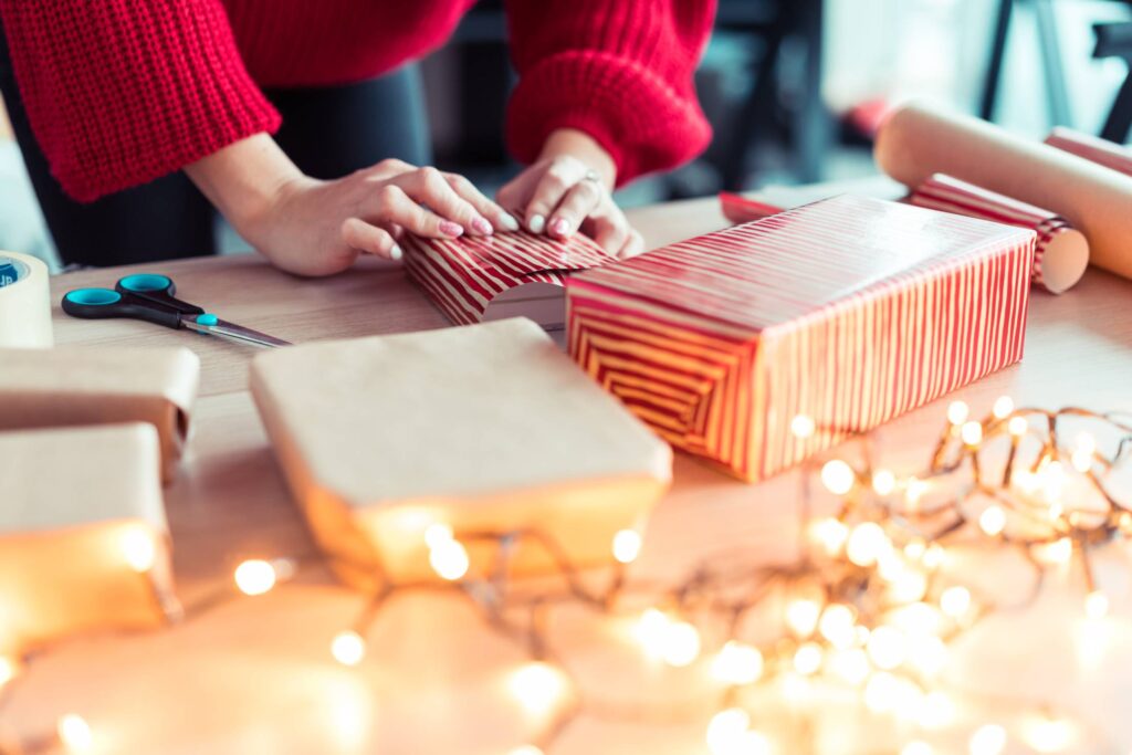 Woman Wrapping Christmas Gifts Free Photo