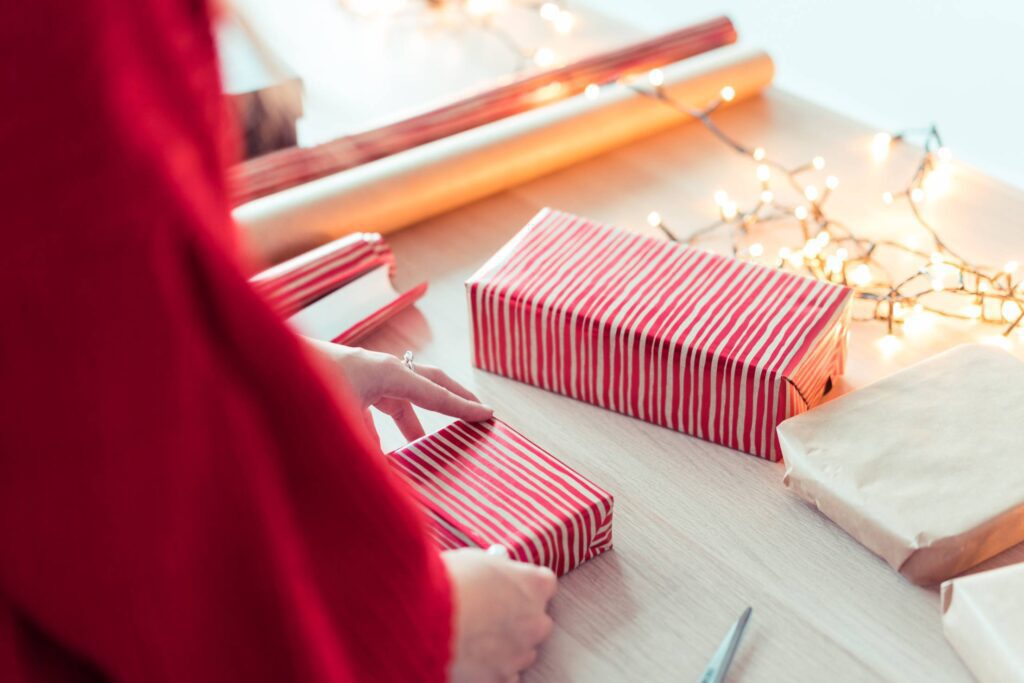 Woman Wrapping Christmas Presents Free Photo