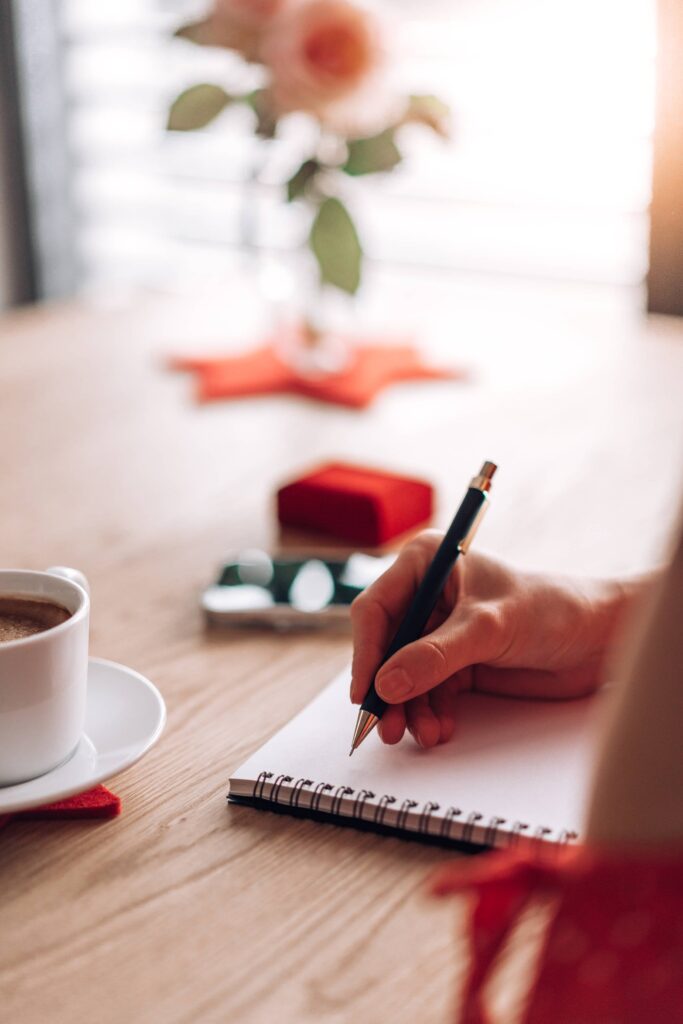 Woman Writing in Her Diary on Sunday Free Photo