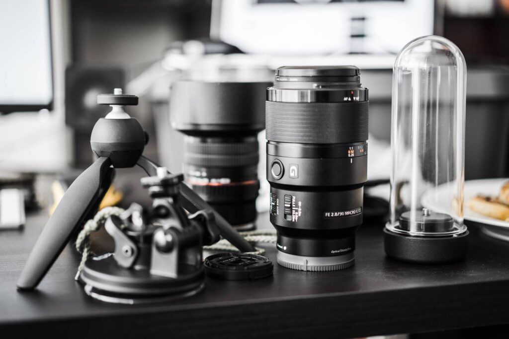 Workdesk Mess and Professional Photography Gear Free Photo