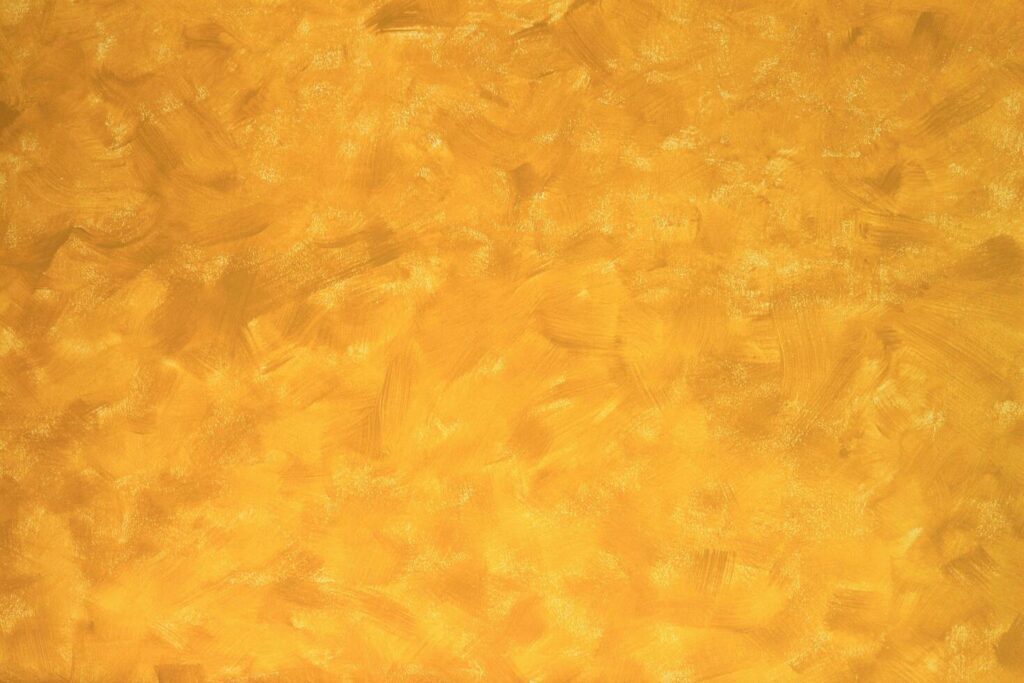 Yellow interior concrete wall background with abstract detail grain texture of paint brush strokes decorative on surface Stock Free