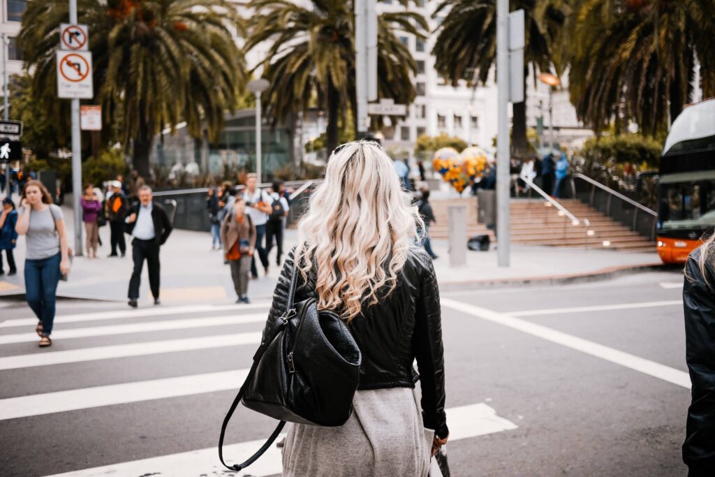 Young Blonde Walking Towards Union Square in SF Free Photo