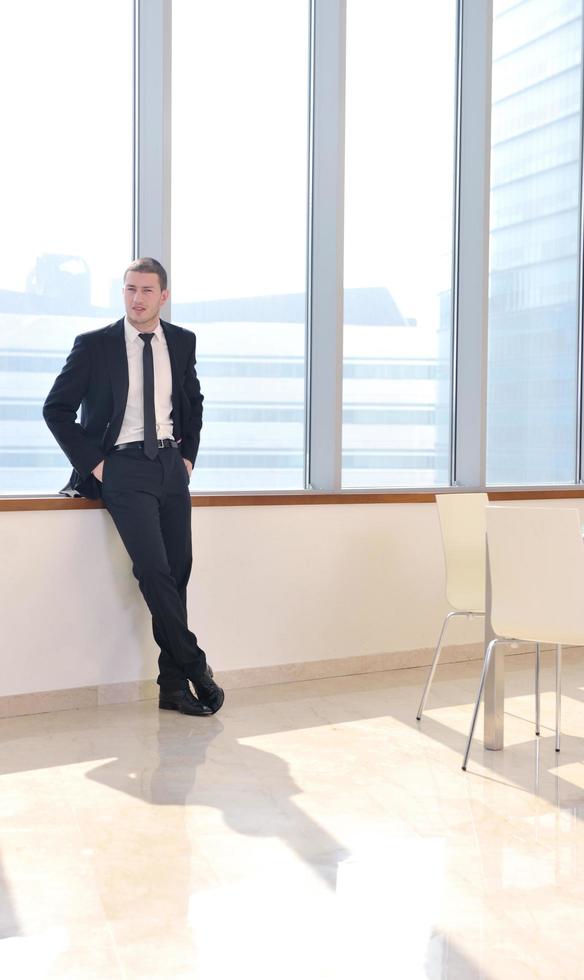 young business man alone in conference room Stock Free