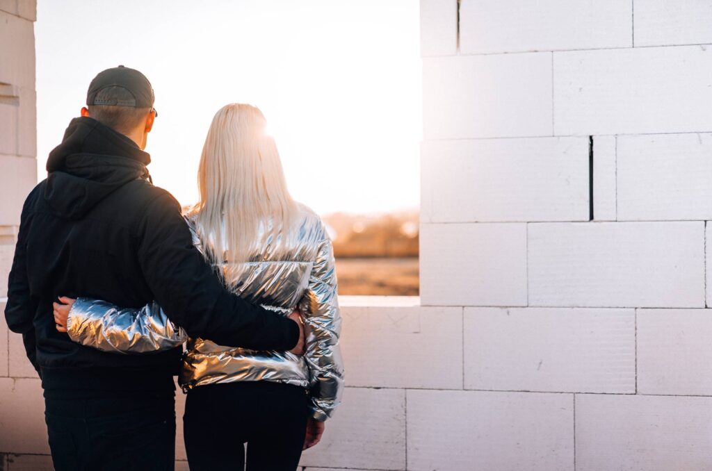 Young Couple Looking Out of The Future Window Free Photo