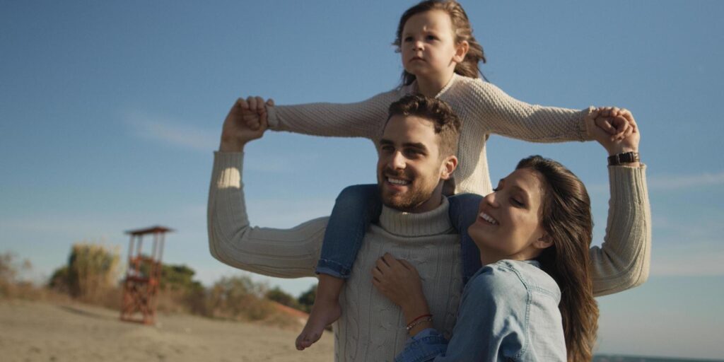 
									Young family enjoying vecation during autumn Free Photo