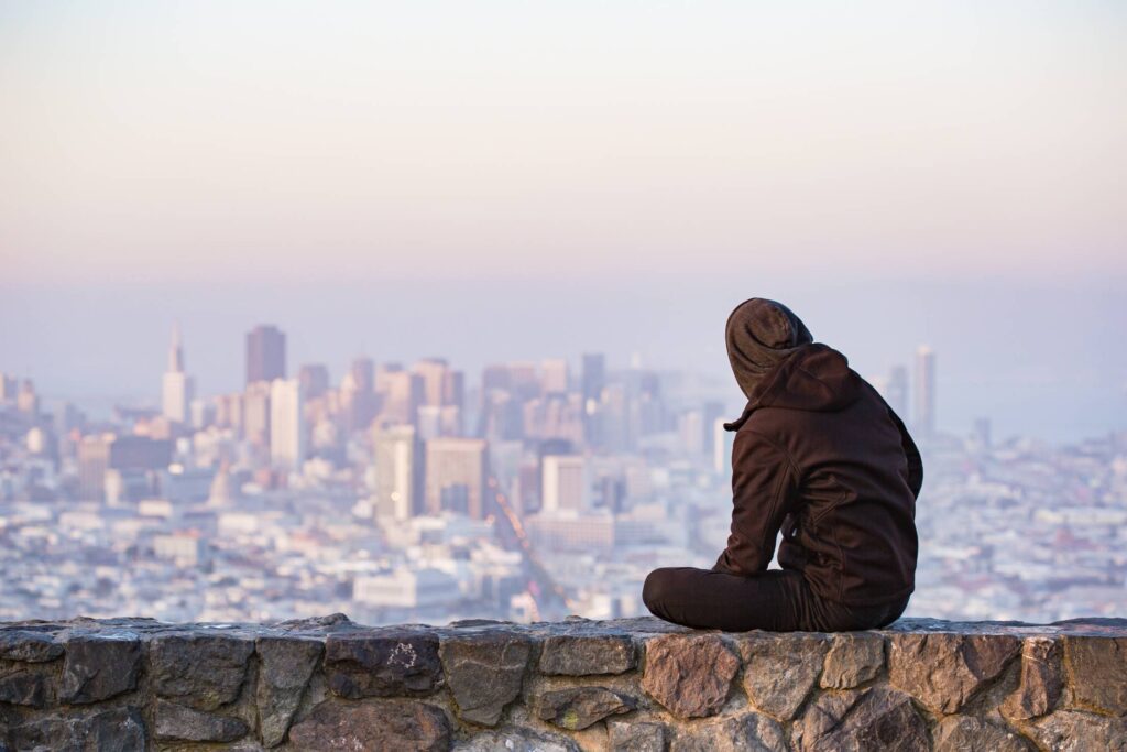 Young Man Enjoying Moment and Looking Over the San Francisco Free Photo