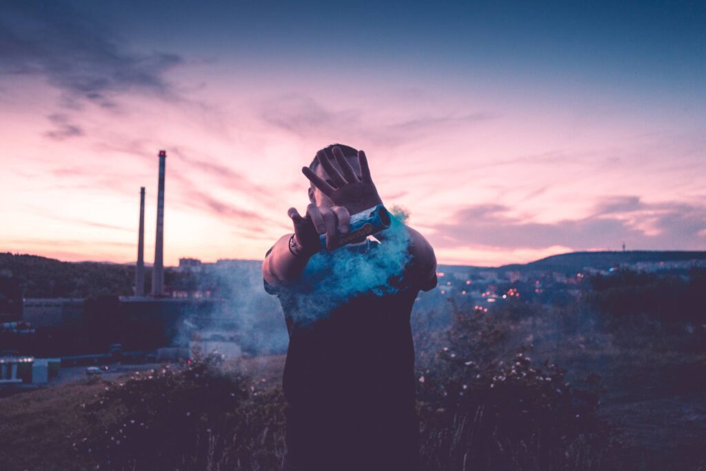 Young Man With Smoke Grenade Free Photo