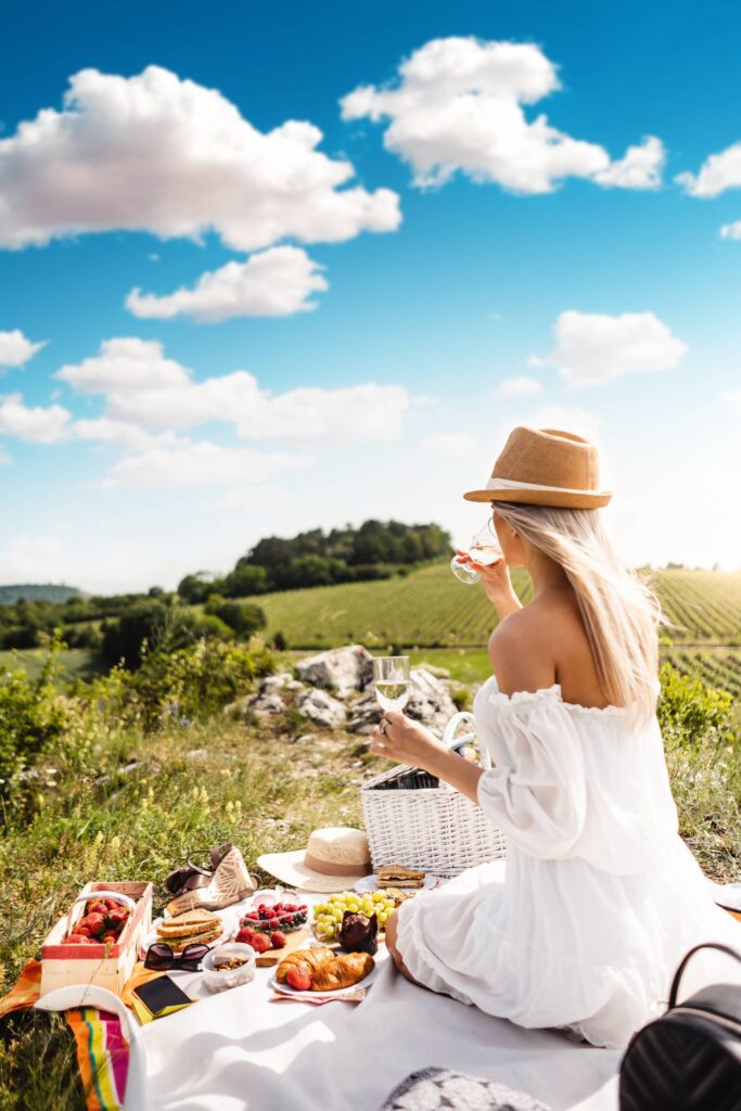 Young Woman Enjoying a Picnic Free Photo