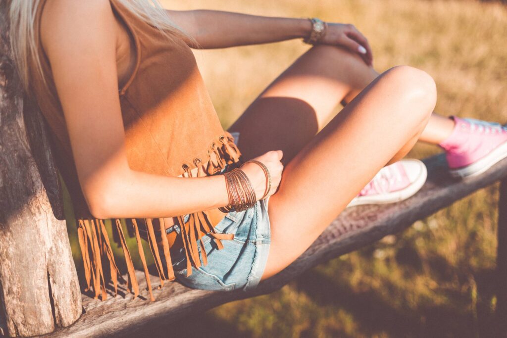 Young Woman Enjoying Sunset in Boho Style Free Photo