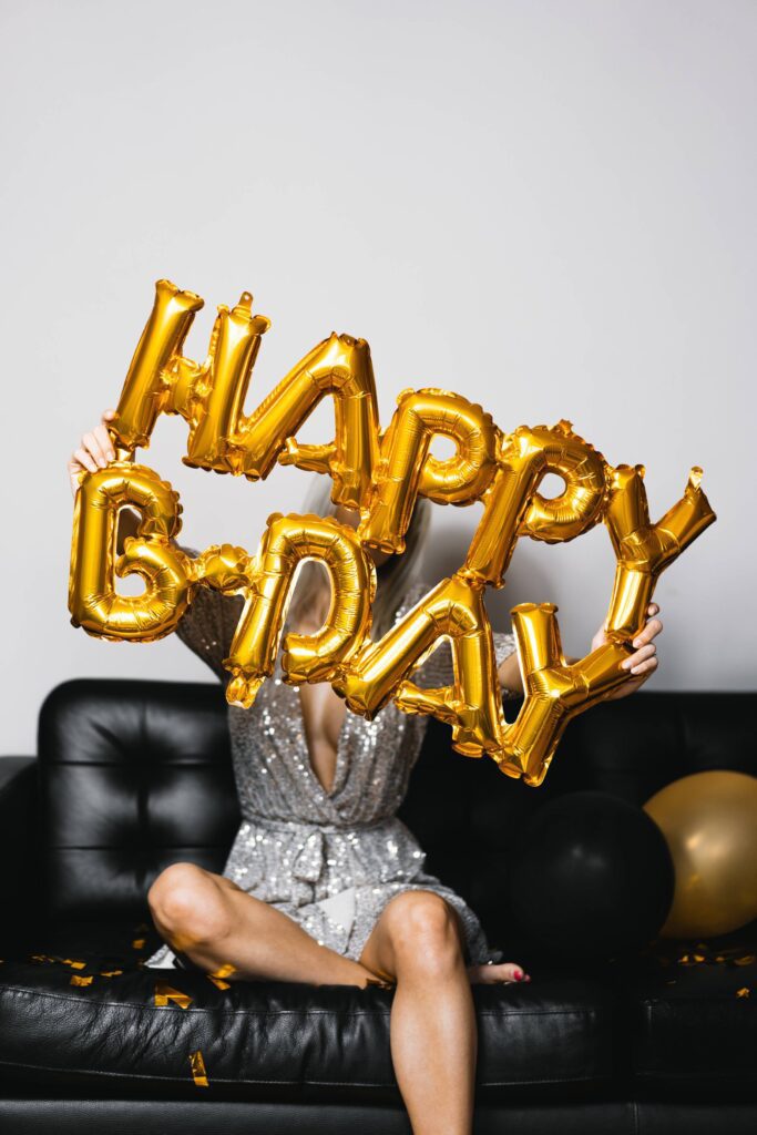 Young Woman Holding Inflatable Happy BDay Birthday Balloons Free Photo