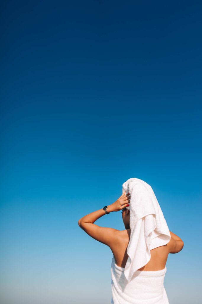 Young Woman in Towel After Morning Hair Wash Free Photo