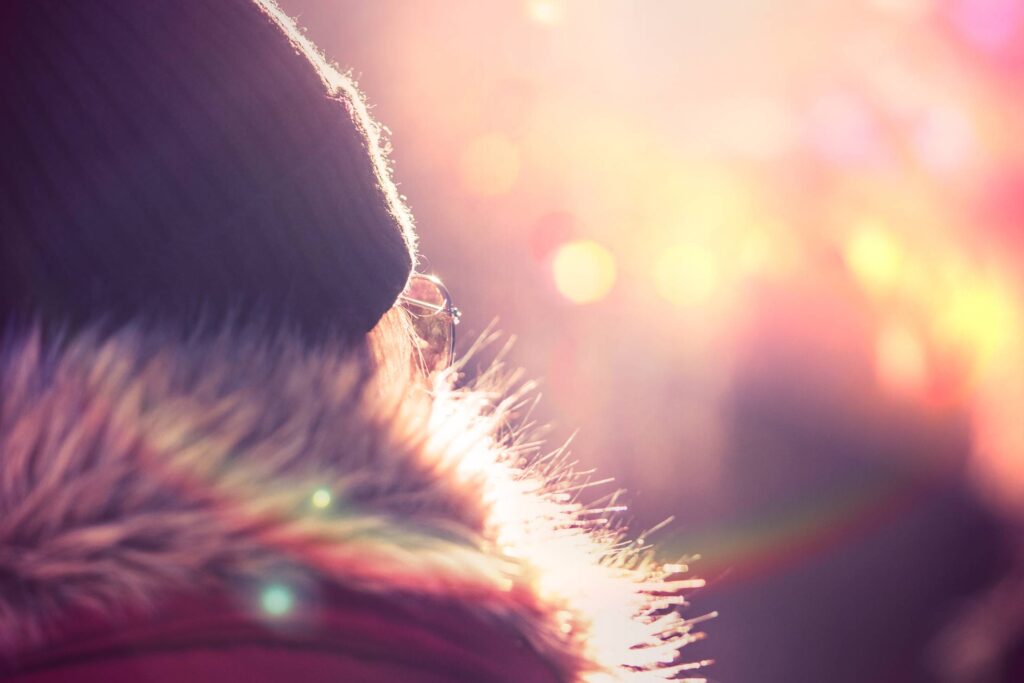 Young Woman in Winter Jacket and Hat Free Photo