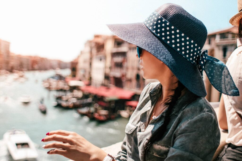 Young Woman on Rialto Bridge in Venice, Italy Free Photo