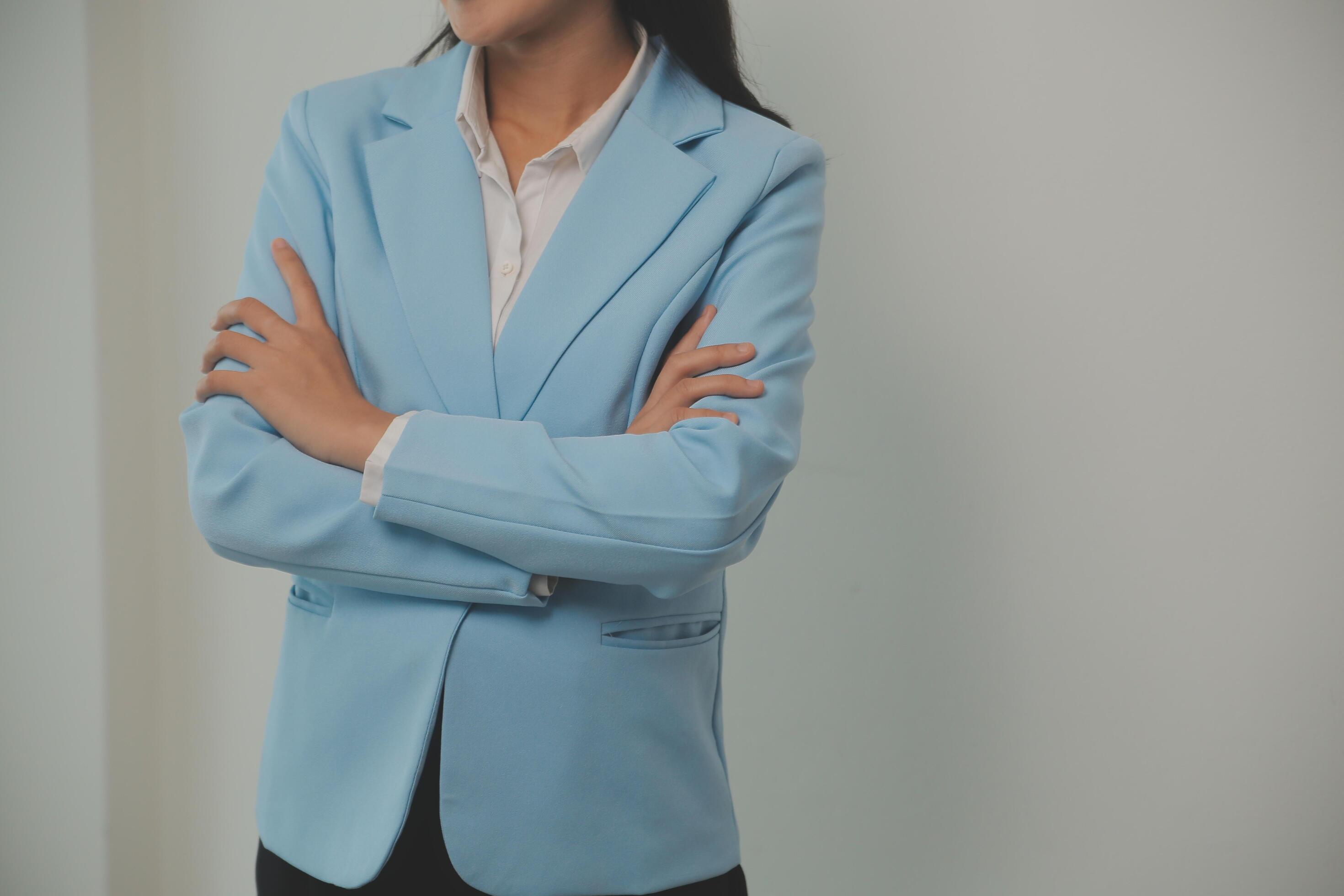 Young business arab woman isolated against a white background who feels confident, crossing arms with determination. Stock Free