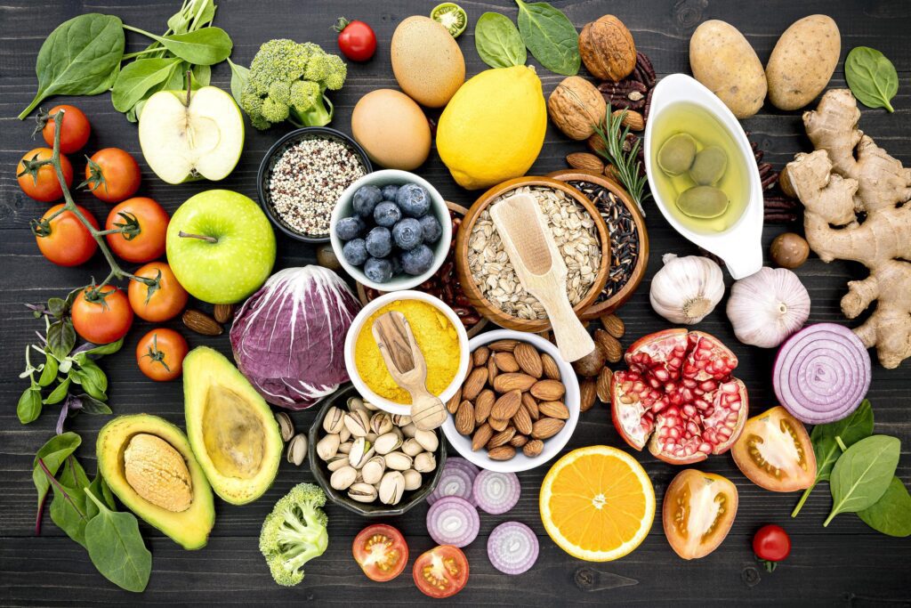 Top view of healthy foods on a dark background Stock Free