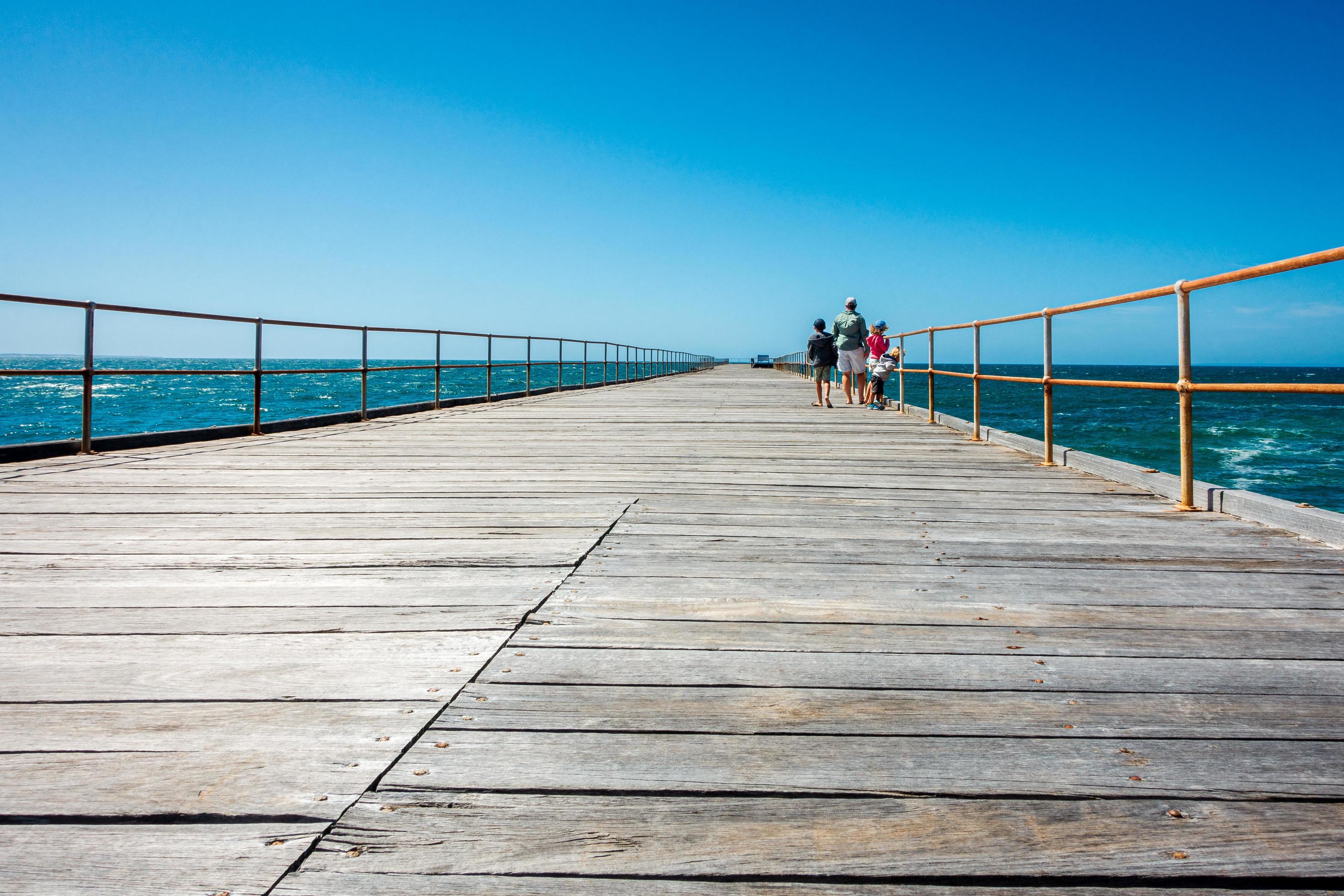 Family Walking on a boardwalk Stock Free