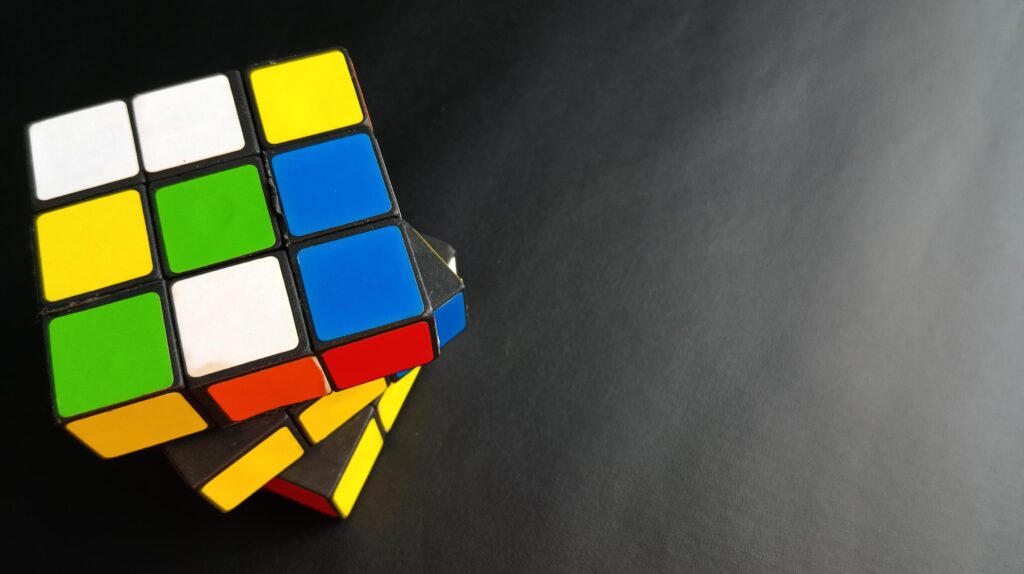 Rubik’s cube on black background Stock Free