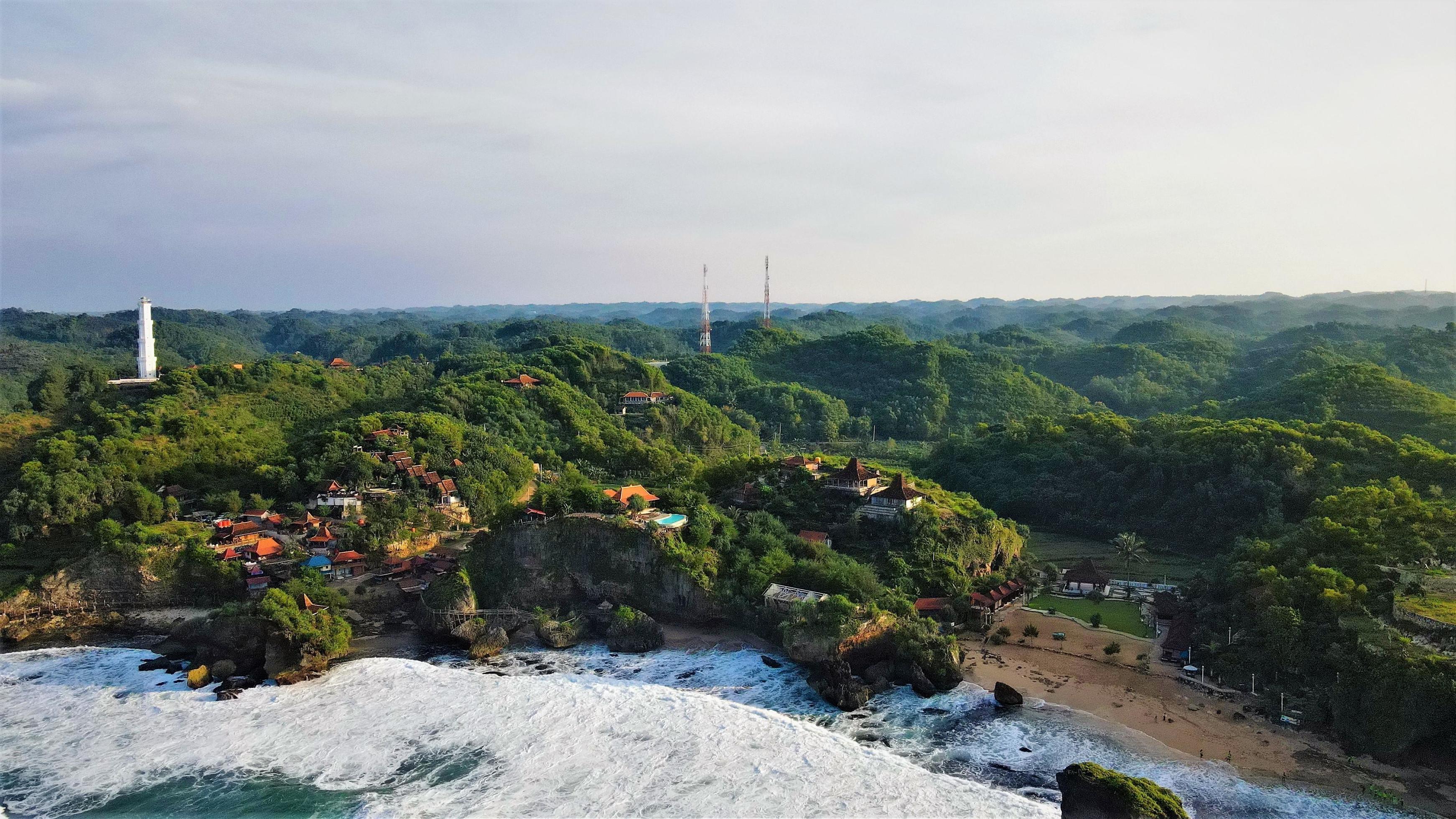 Beautiful aerial views, natural panorama – Pandansari beach background – with blue waves. Stock Free