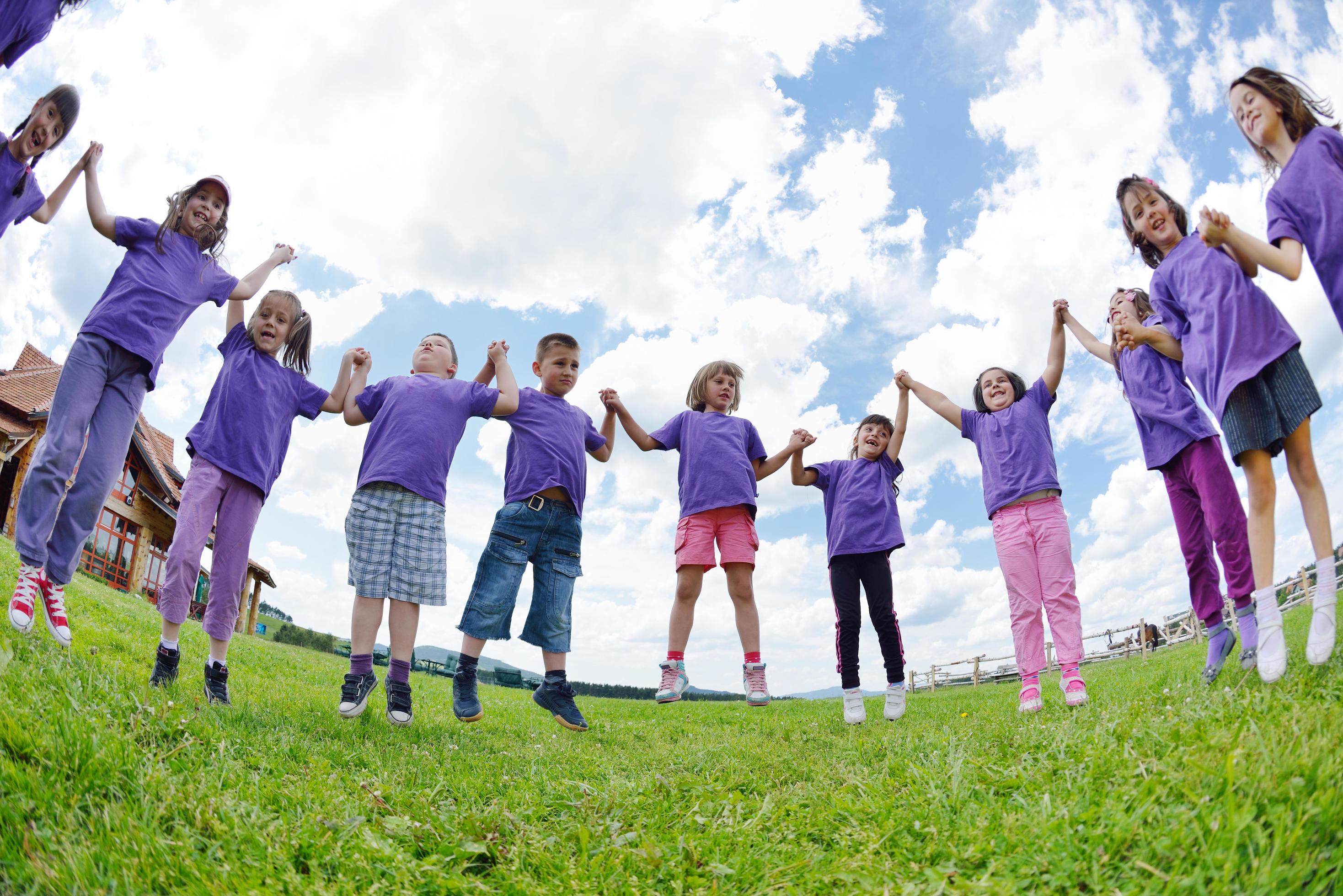 happy kids group have fun in nature Stock Free