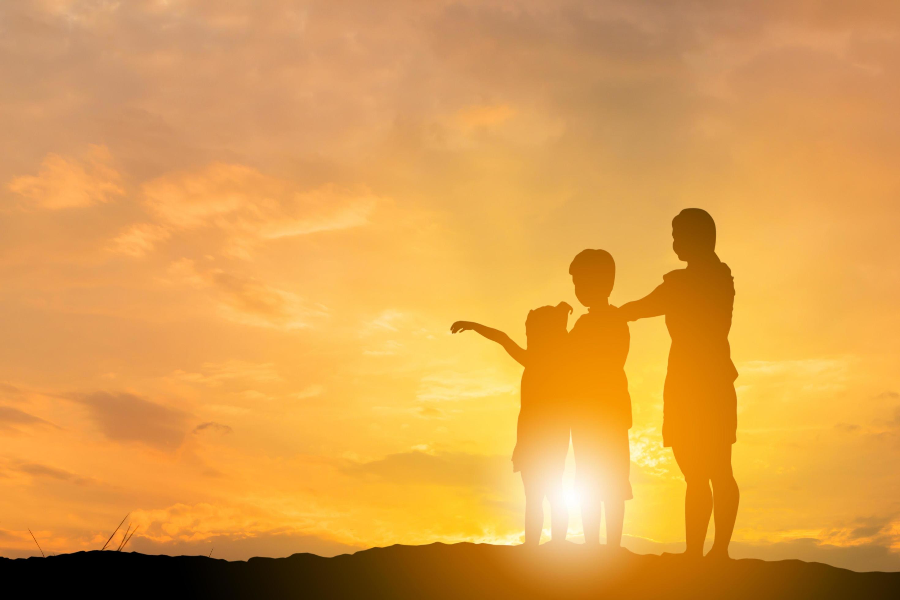 Silhouette of Brother and sister ran to mother at sunset background, Happy Mother and child concept, with clipping path. Stock Free