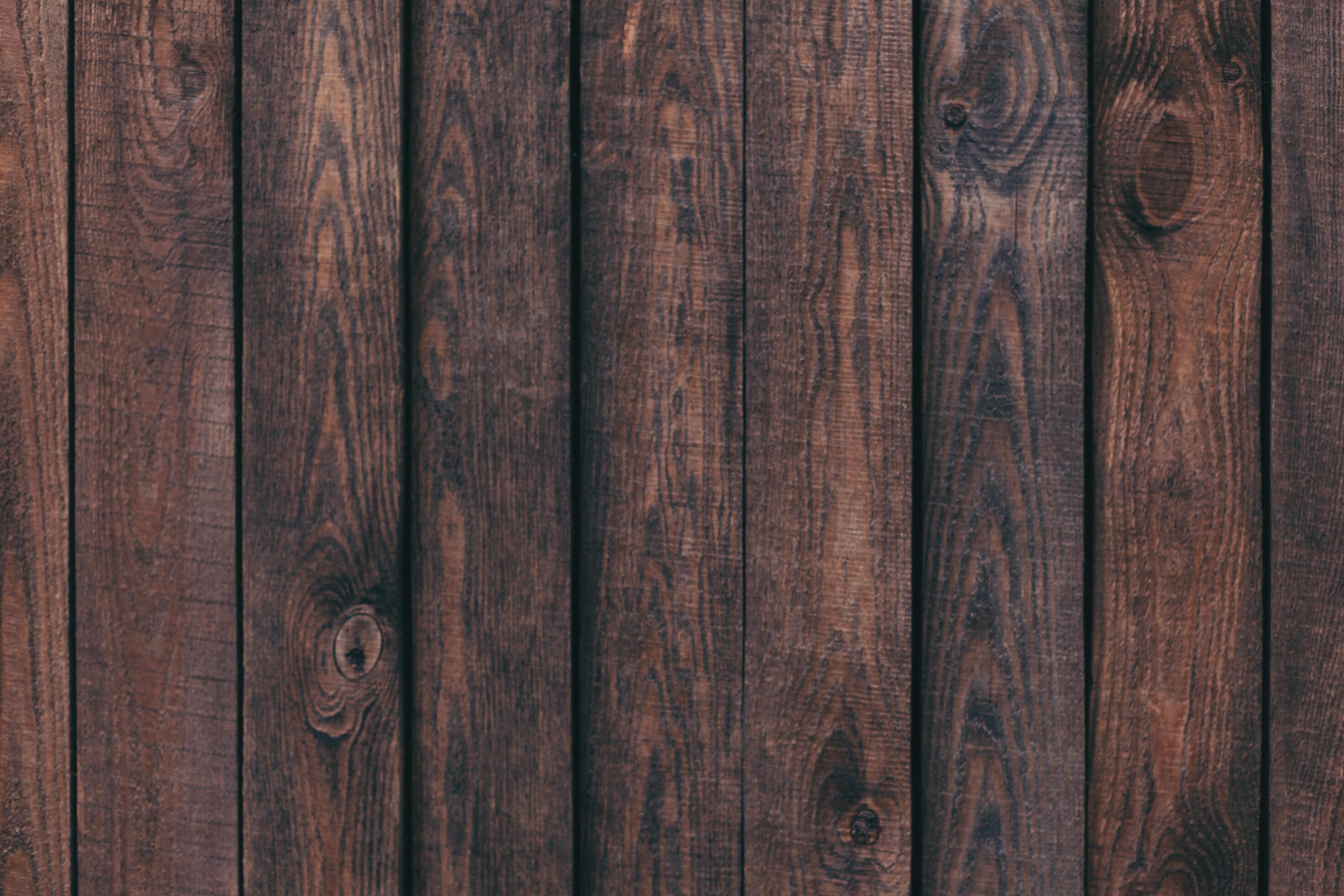 Dark brown wood texture or background. Stock Free