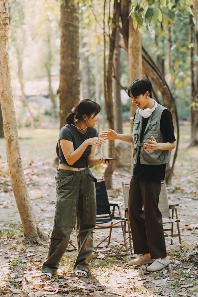 Asian couple sweet in tent inside on they camping trip, traveller relax and sleep togather in out door and camping trip Stock Free