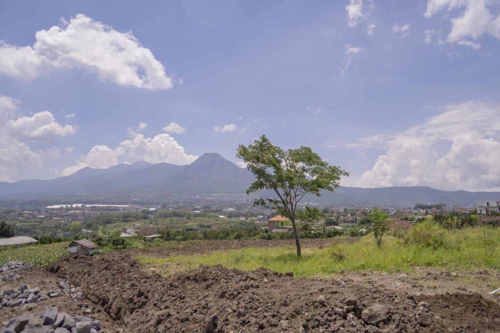 Landscape scene mountain tree and blue sky with cloudy. The photo is suitable to use for nature background, environment poster and nature content media. Stock Free