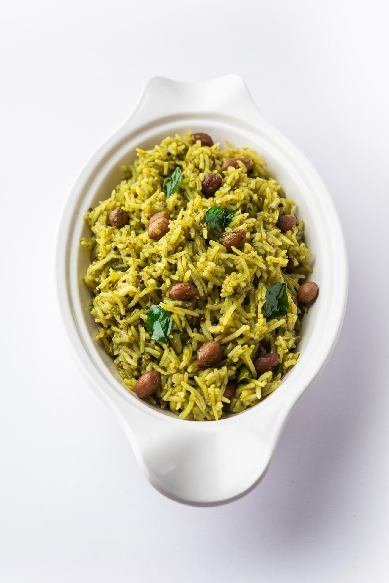 Palak khichdi is a one pot nutritious meal of mung lentils and rice with spinach, Indian food Stock Free