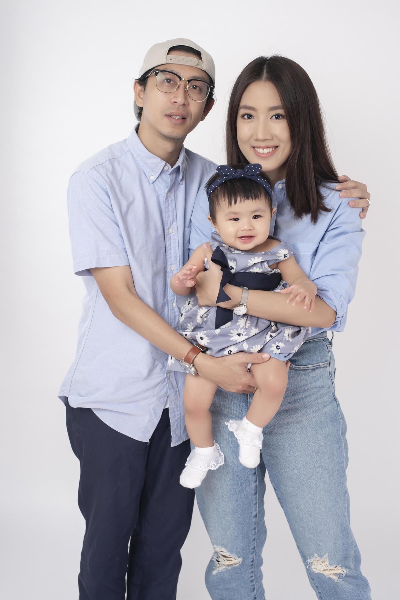 Happy Asian family on white background Stock Free