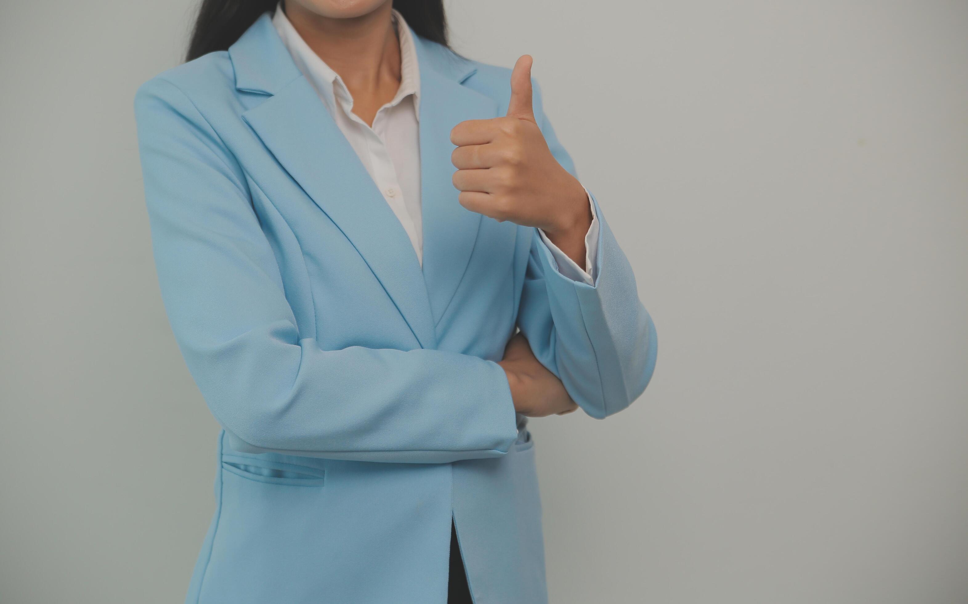 Young business arab woman isolated against a white background who feels confident, crossing arms with determination. Stock Free