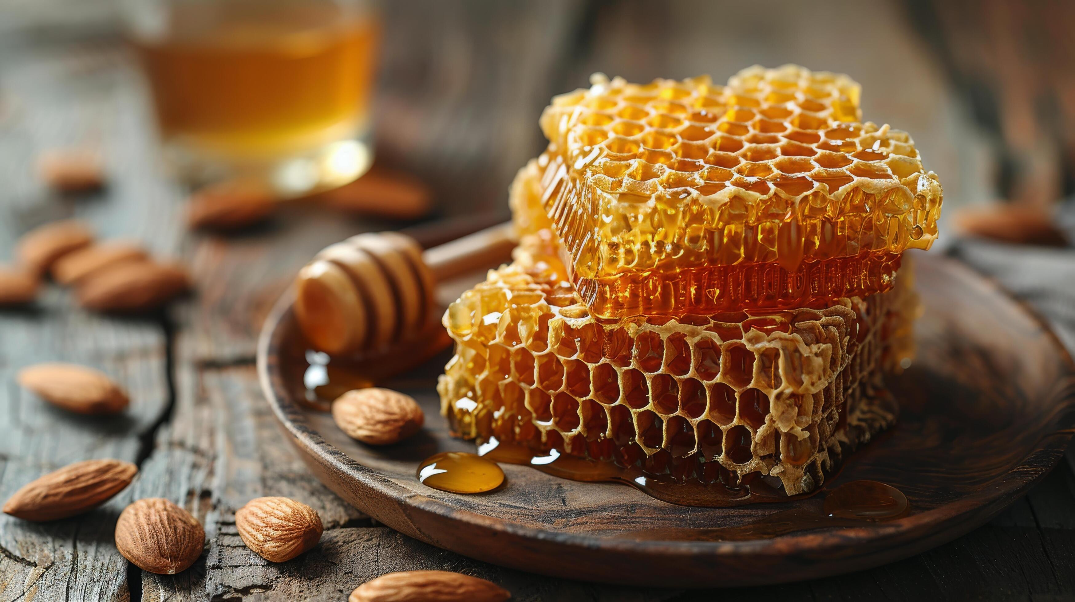 Honeycomb and Almonds on a Wooden Table Stock Free