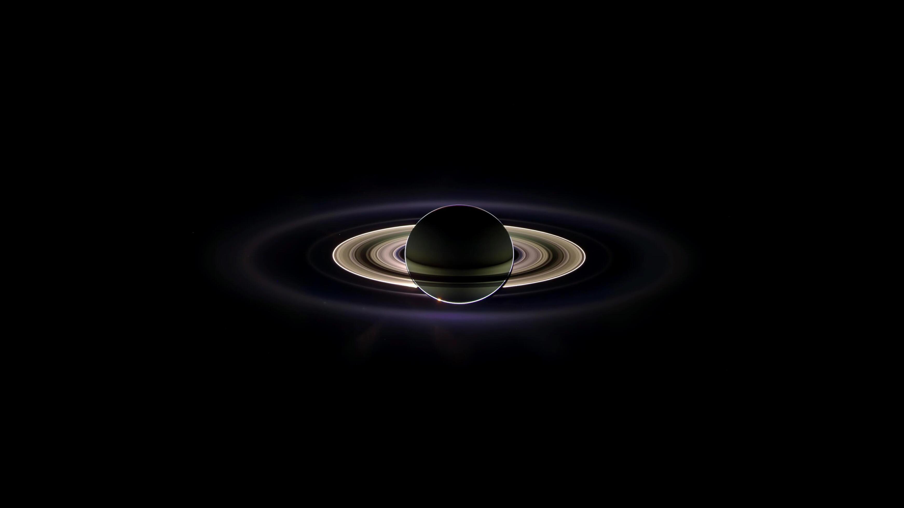 Saturn with rings isolated on black background. Universe science astronomy Stock Free