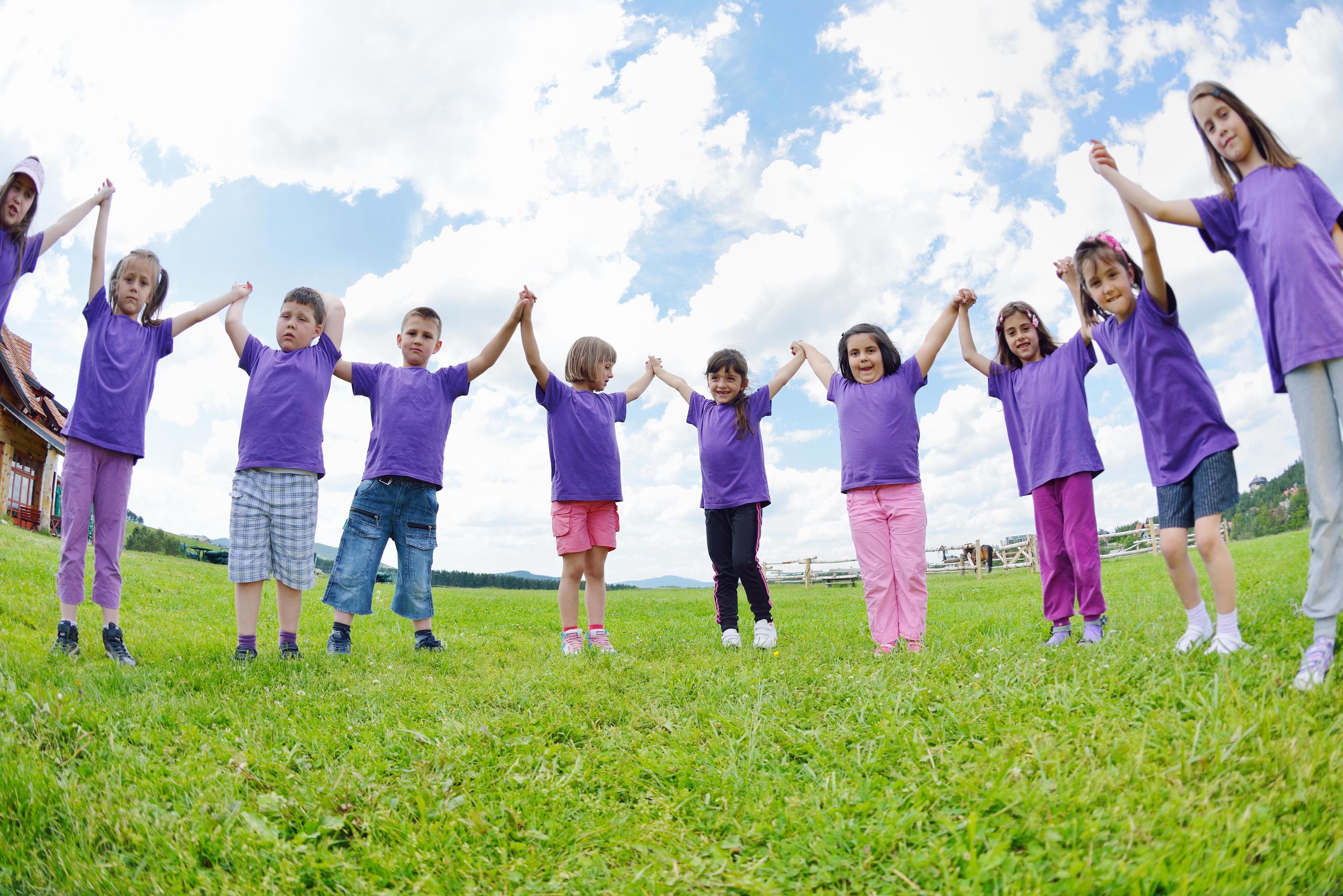 happy kids group have fun in nature Stock Free