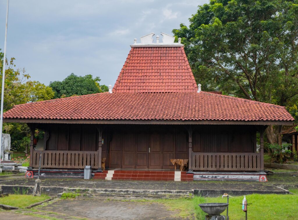 Traditional house of Central Java with nature and blue sky. The photo is suitable to use for traditional design house of Java people. Stock Free