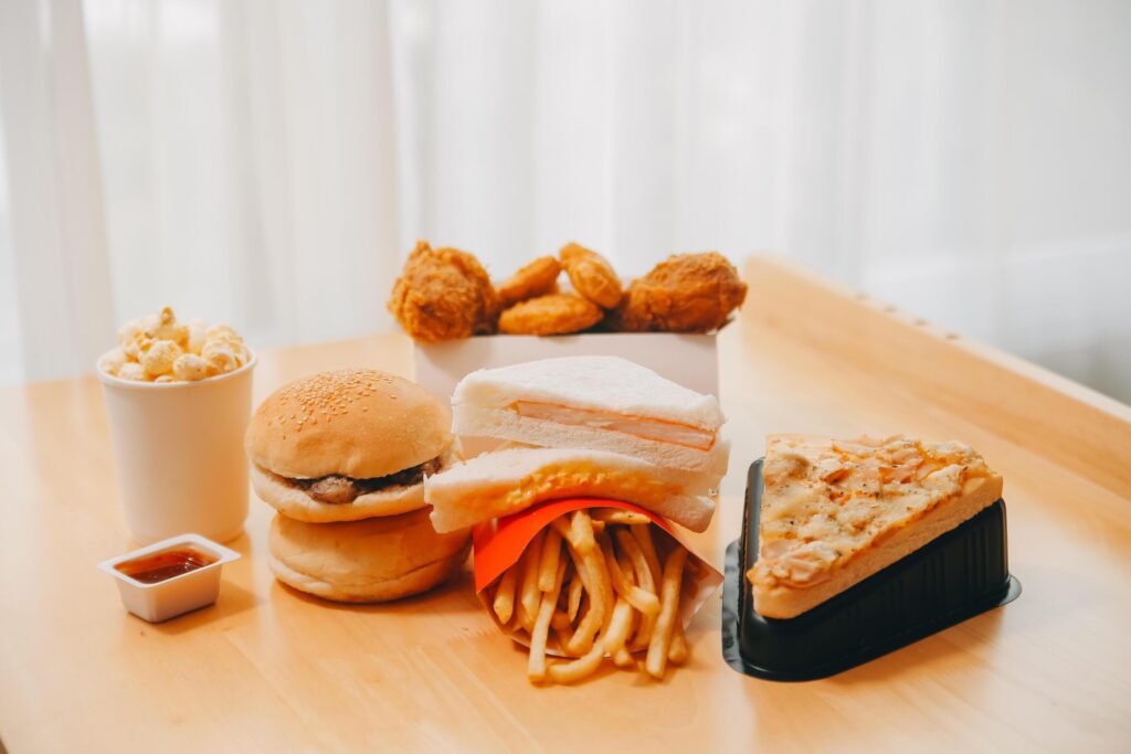 Closeup of home made burgers on wooden background Stock Free