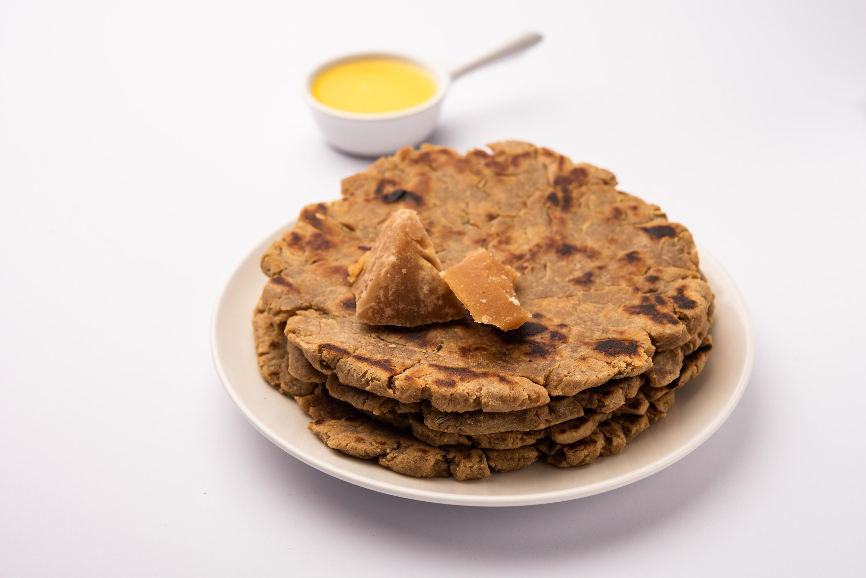 Sweet roti made out of rice flour, jaggery, and ghee. Gud ki roti. gur ki roti, jaggery Bhakri, meethi gud ki roti. Winter food. Copy space. Stock Free