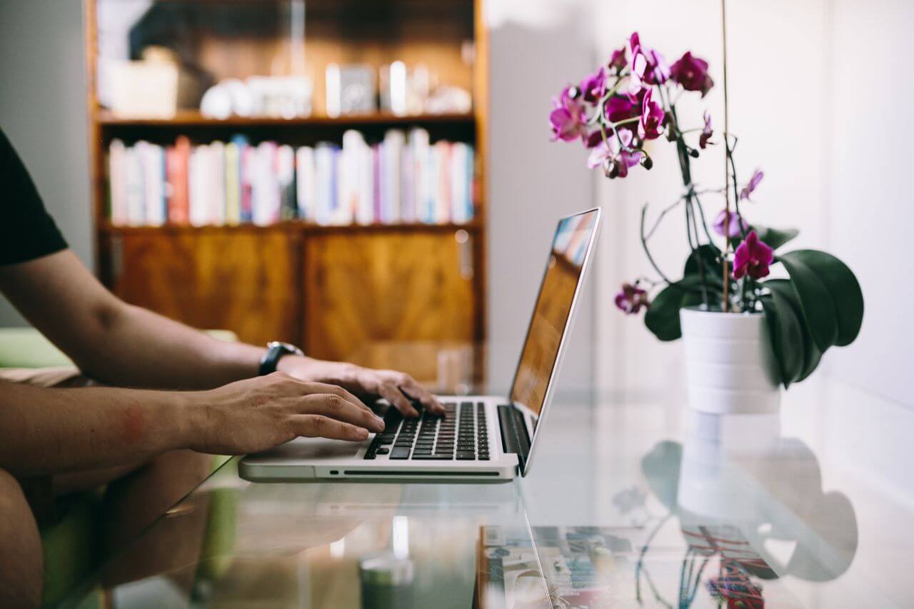 Man Glass Desk Laptop Stock Free