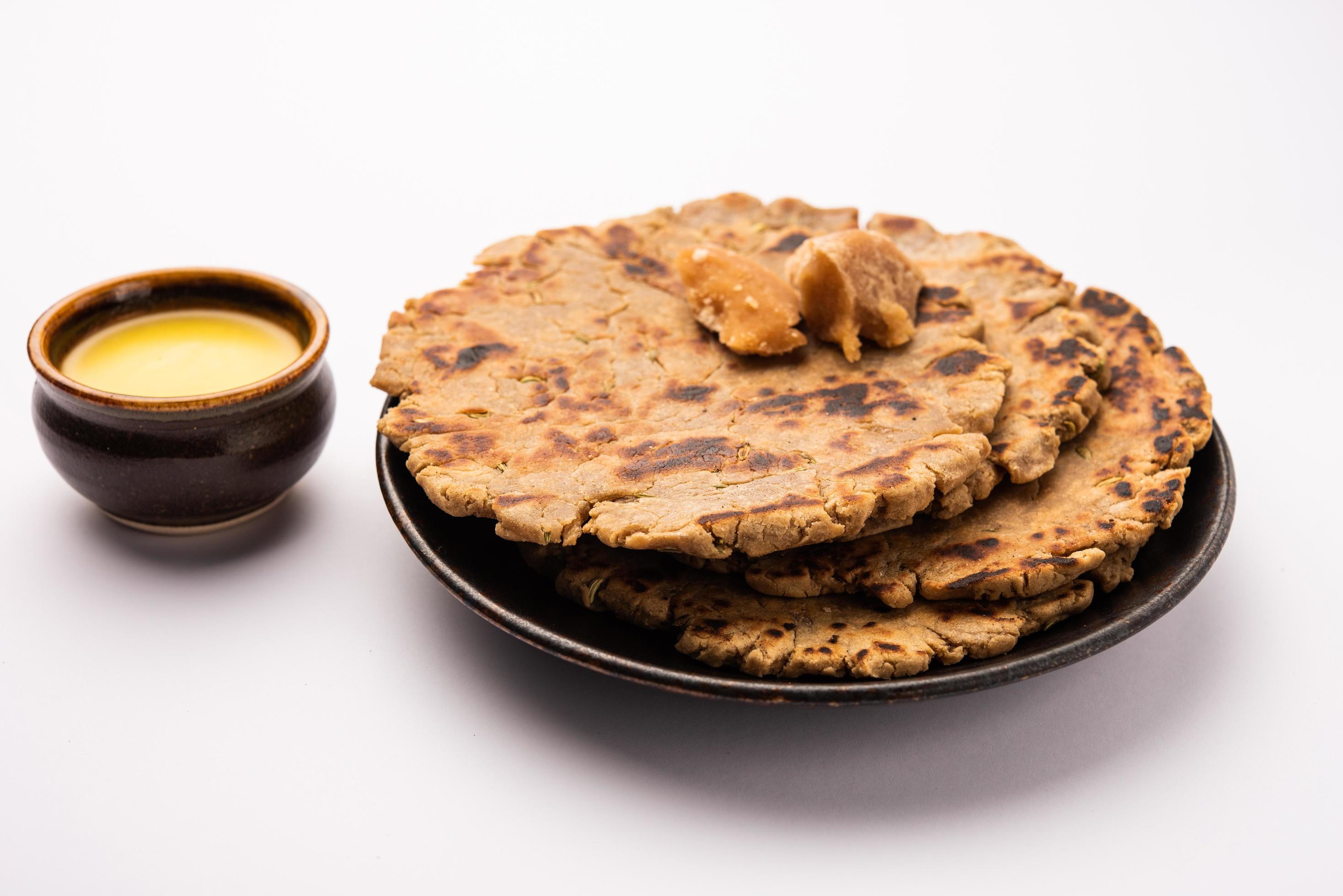 Sweet roti made out of rice flour, jaggery, and ghee. Gud ki roti. gur ki roti, jaggery Bhakri, meethi gud ki roti. Winter food. Copy space. Stock Free