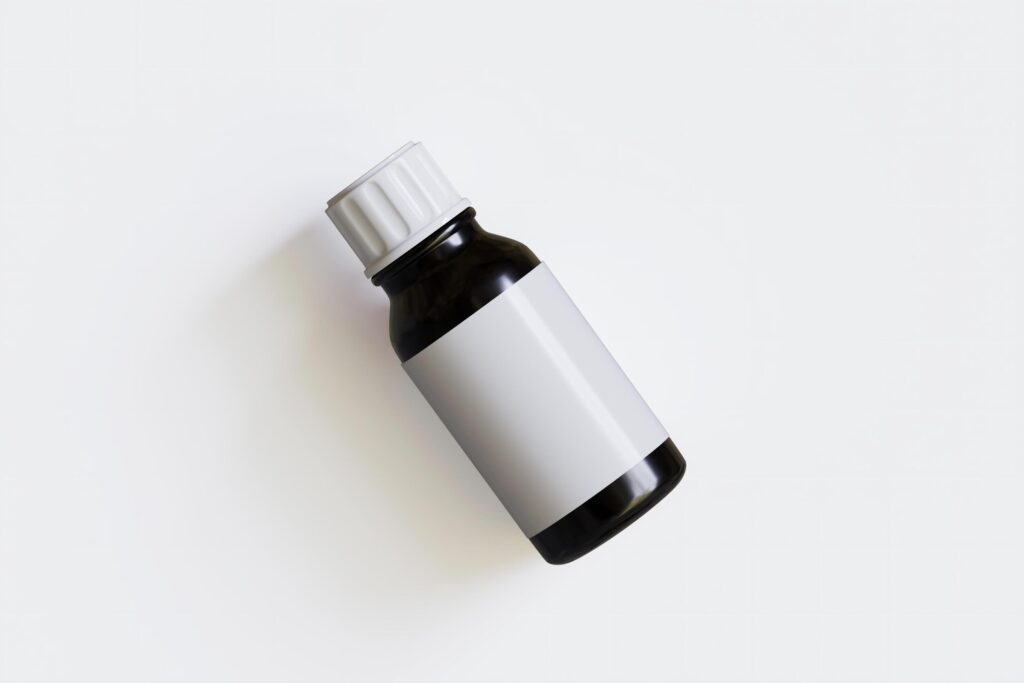 Packaging bottle black color and white blank label for medicine, pill or supplement, cosmetic, chemical and etc on white background Stock Free