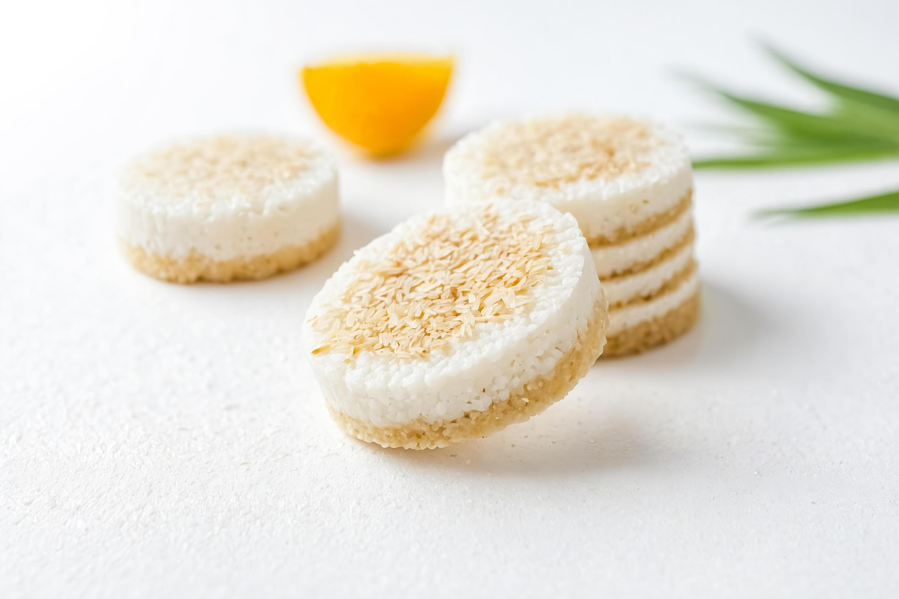 Close Up of Rice Cakes with Sesame Seeds on White Background Stock Free